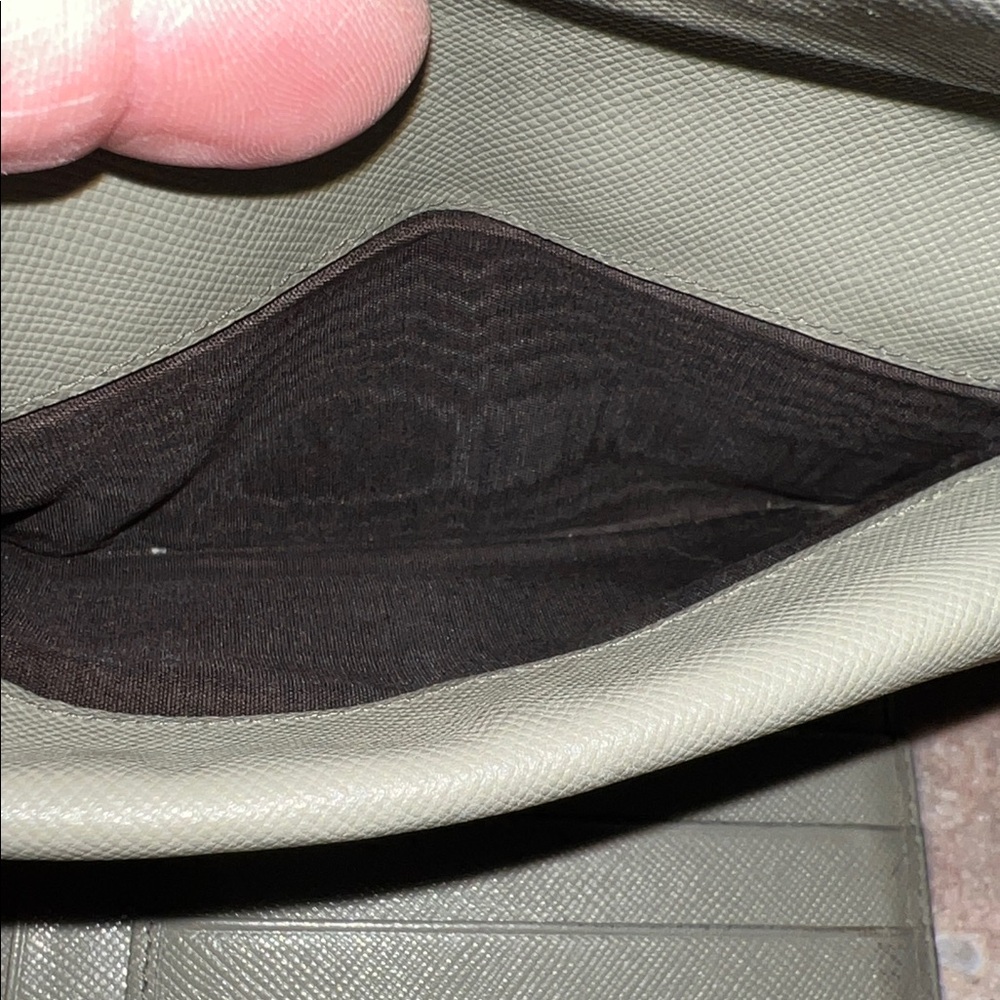 Prada olive Leather Wallet. Lots of life left 
GUC. Leather is in good shape - Picture 8 of 12